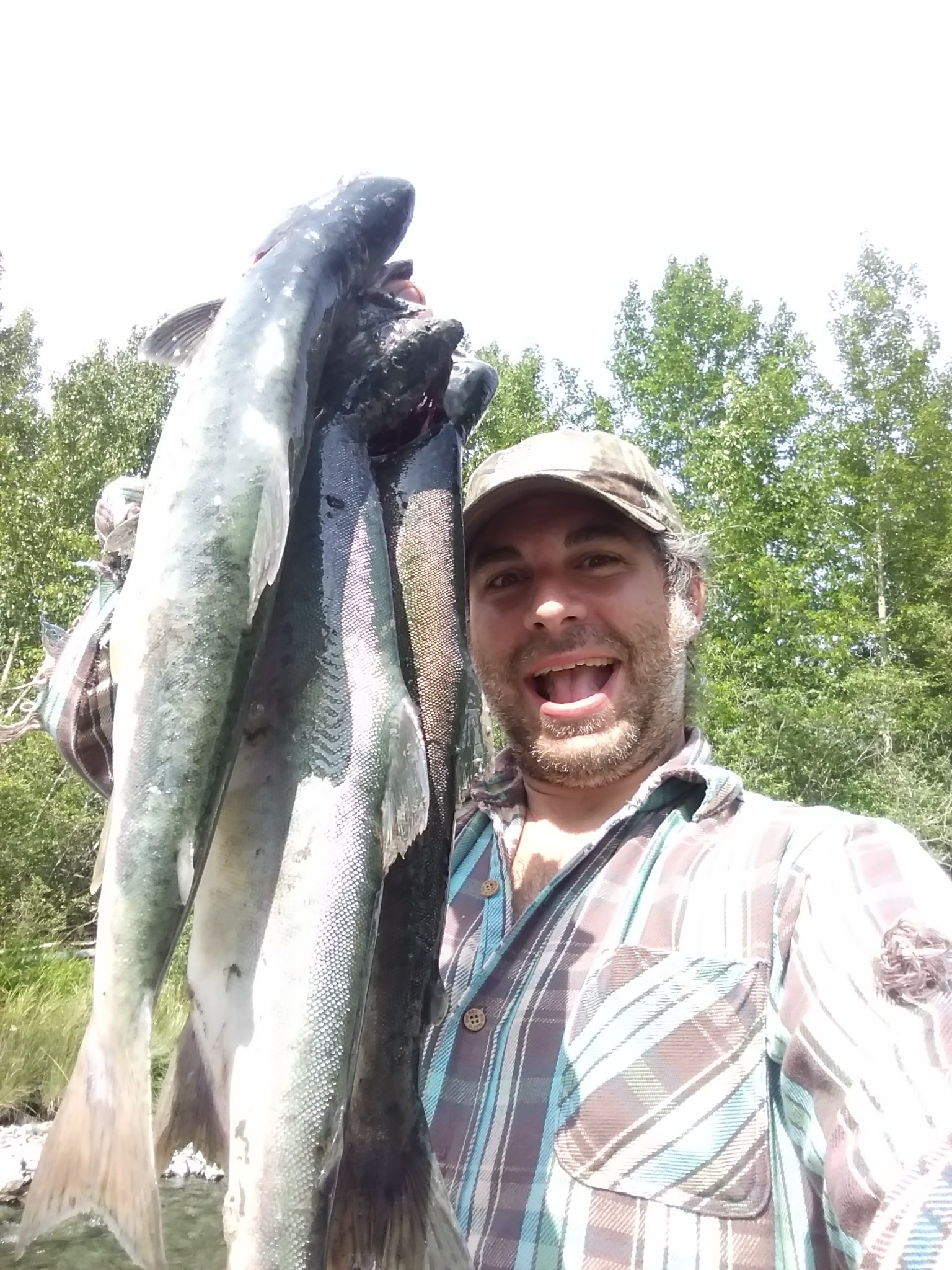 Russ holding fresh Alaska salmon